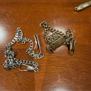 14 inches for the silver chain
 and 15 1/2 inches for the brassy colored 
chain